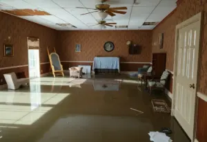 Interior of Reid's New Golden Gate Funeral Home showing flood damage